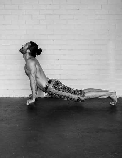 Shena keshide - stretch push-ups end posture side view